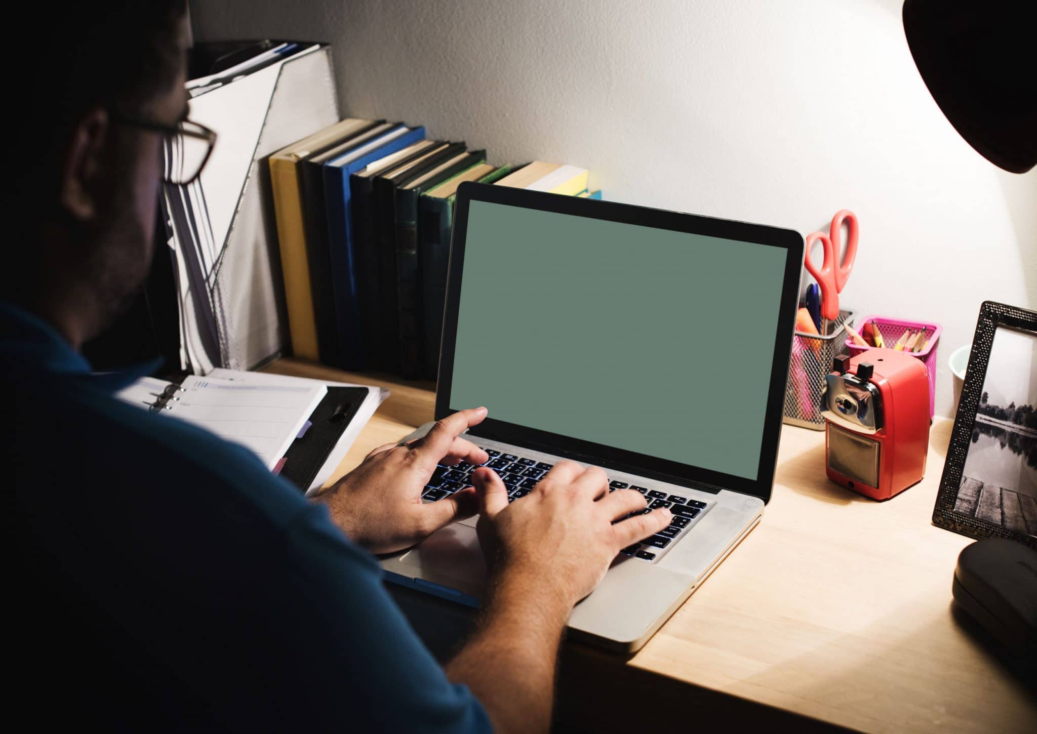 Man Working At His Laptop Late At Night