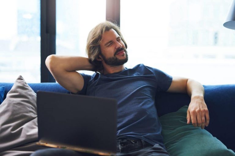 Man Suffering From Neck Pain